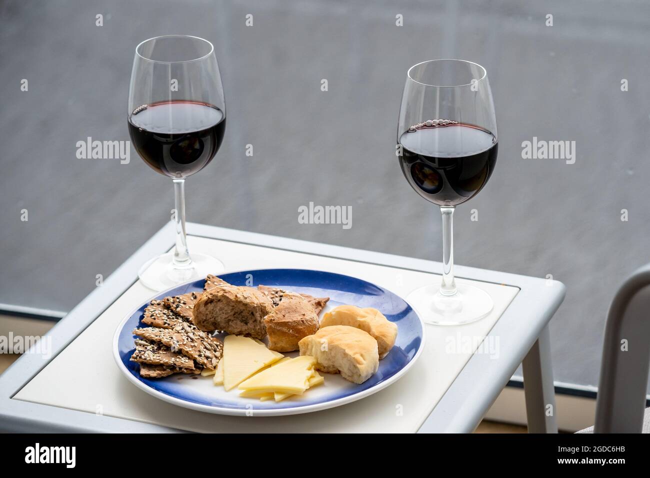 Red wine and tasty snacks on cruise ship balcony Stock Photo Alamy