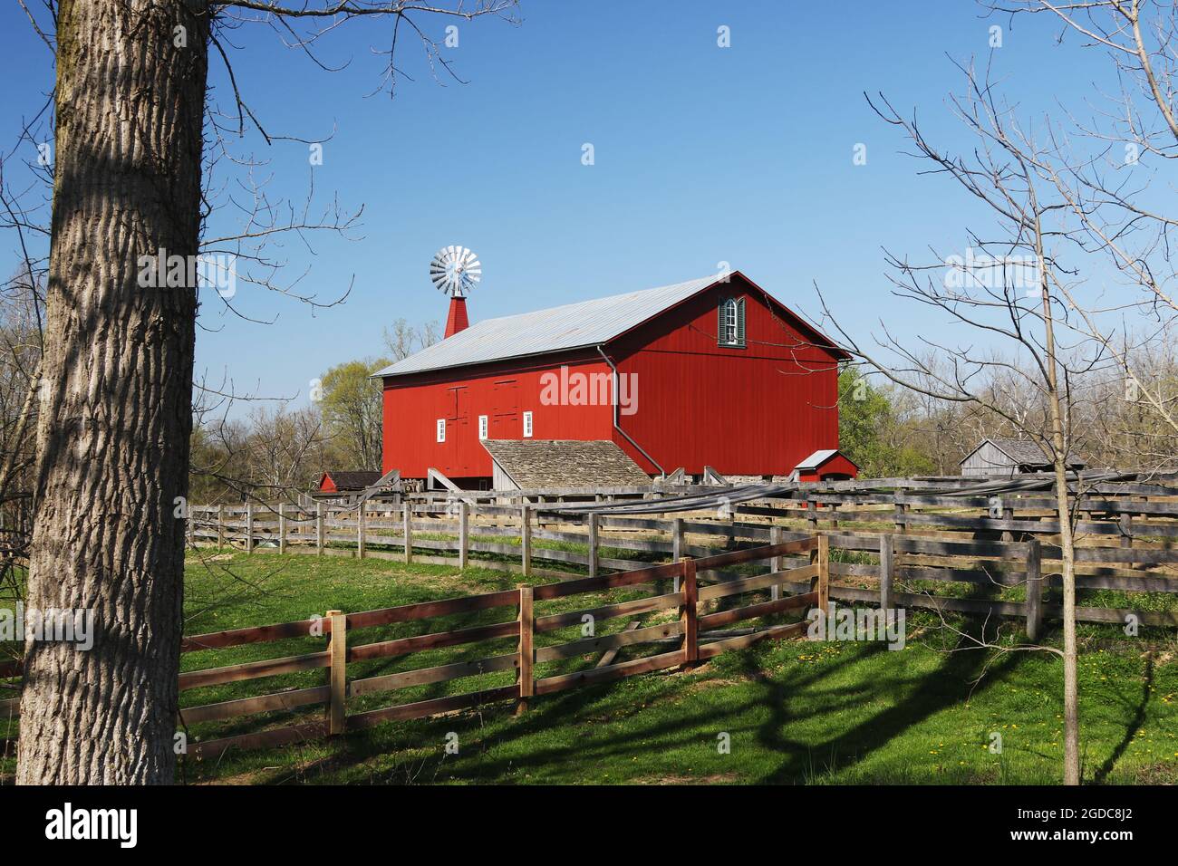 Historic Red Barn. The barn was built in the 1880's and featured a unique enclosed windmill tower. Carriage Hill Metropark, Huber Heights, Dayton, Ohi Stock Photo