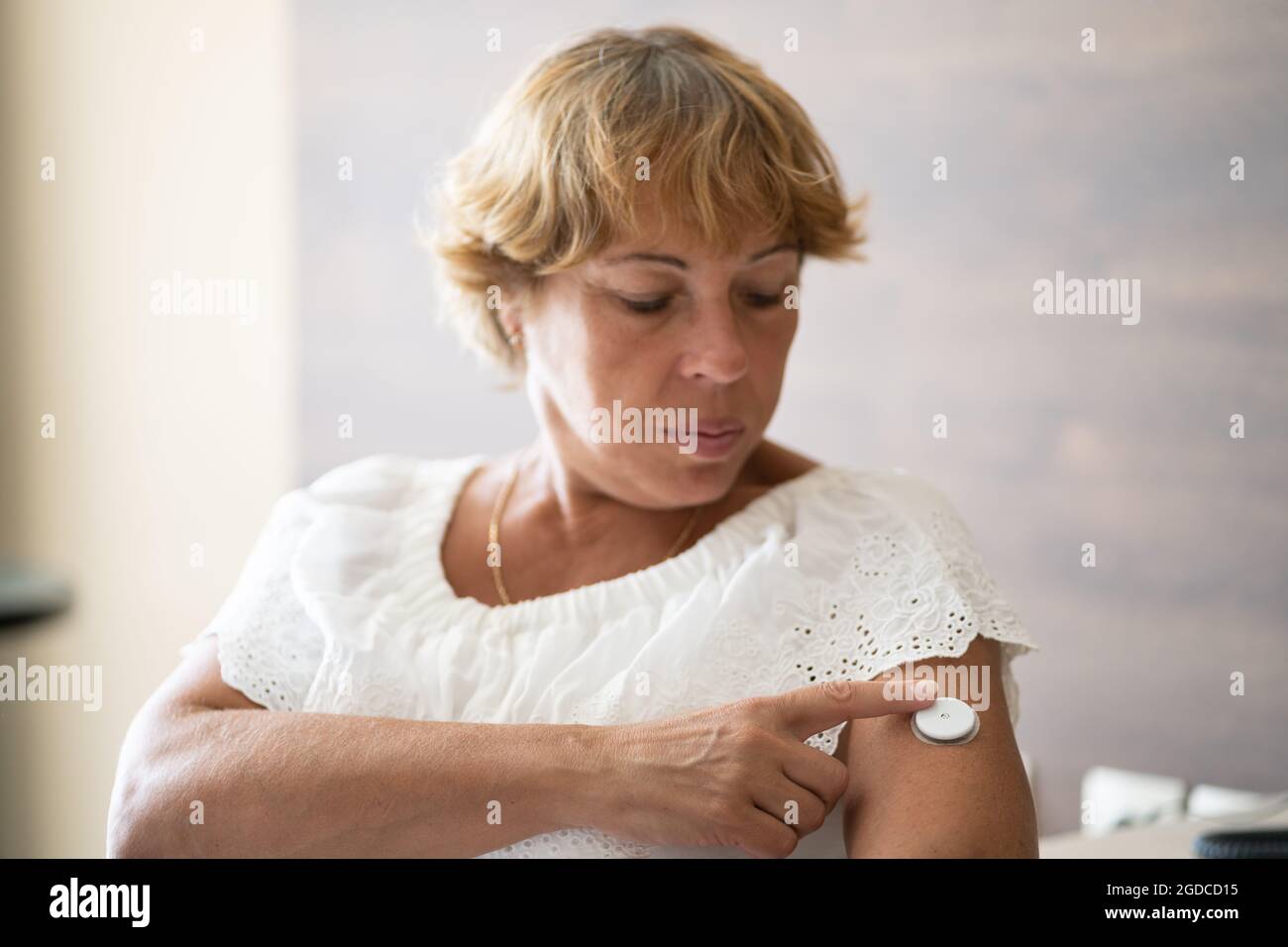 Continuous Glucose Monitoring Sensor Device On Skin Stock Photo