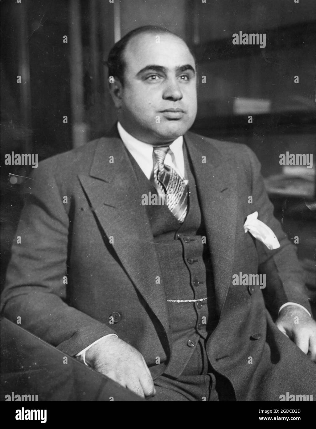 AL CAPONE (1899-1947) American gangster under Chicago police arrest in 1930 Stock Photo