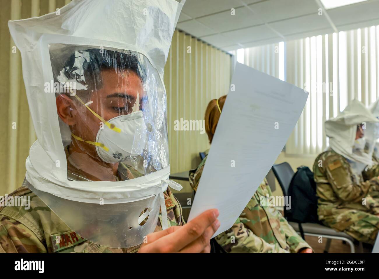 An U.S. Air Force medical provider participates in an N95 mask fit test at the Lodi Memorial Hospital located in Lodi, California, Dec. 29, 2020. Department of Defense medical teams prepare to integrate into California hospitals to provide medical support alongside hospital medical personnel in response to the COVID-19 pandemic. U.S. Northern Command, through U.S. Army North, remains committed to providing flexible U.S. Department of Defense support to the whole-of-America COVID-19 response. (U.S. Army photo by Spc. DeAndre Pierce) Stock Photo