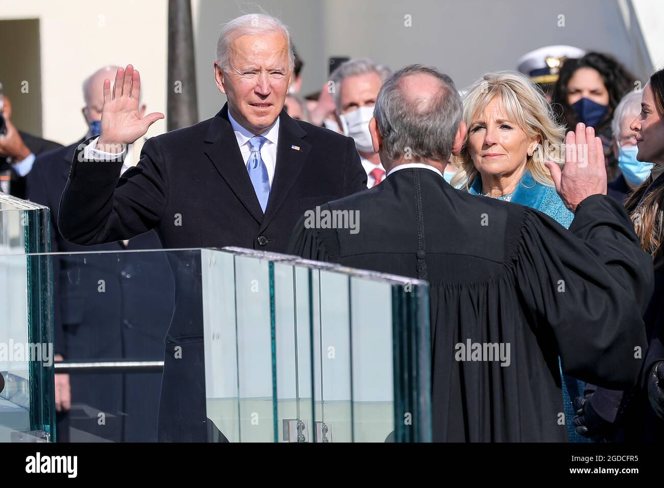 President-elect Joseph R. Biden Jr. takes the presidential oath of office at the U.S. Capitol, Washington, D.C., Jan. 20, 2021. Once the oath was completed, Biden became the 46th President of the United States of America. (DoD photo by U.S. Army Sgt. Charlotte Carulli) Stock Photo