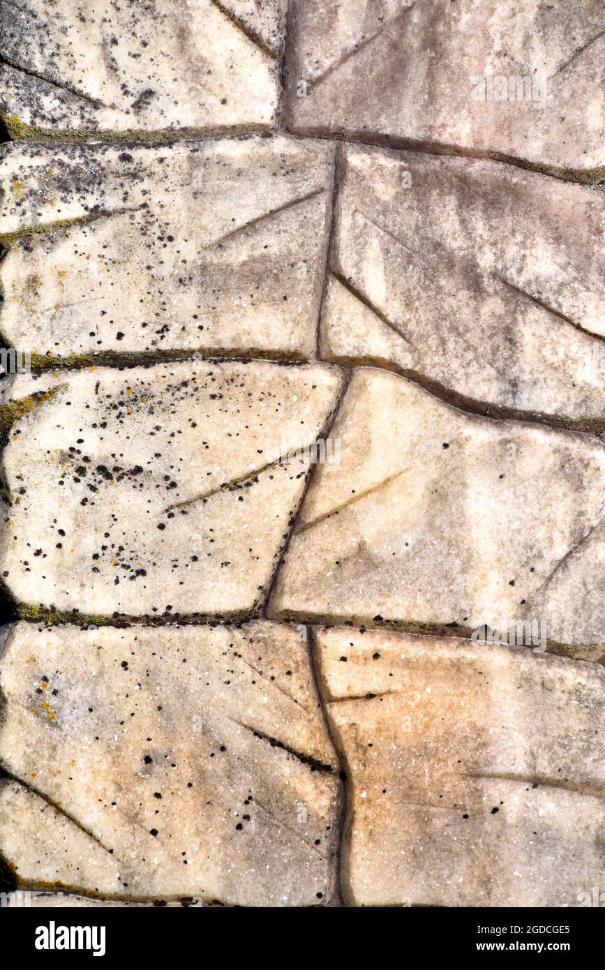 Background image of granite with lines and veins. Weathered and exposed to the elements, granite