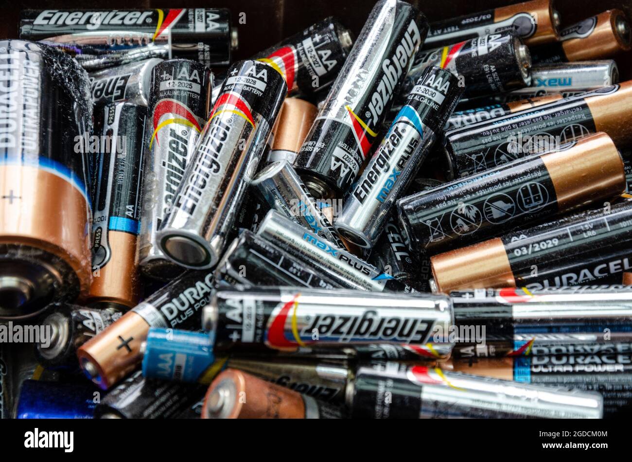 A pile of spent batteries collected to take to be recycled rather than