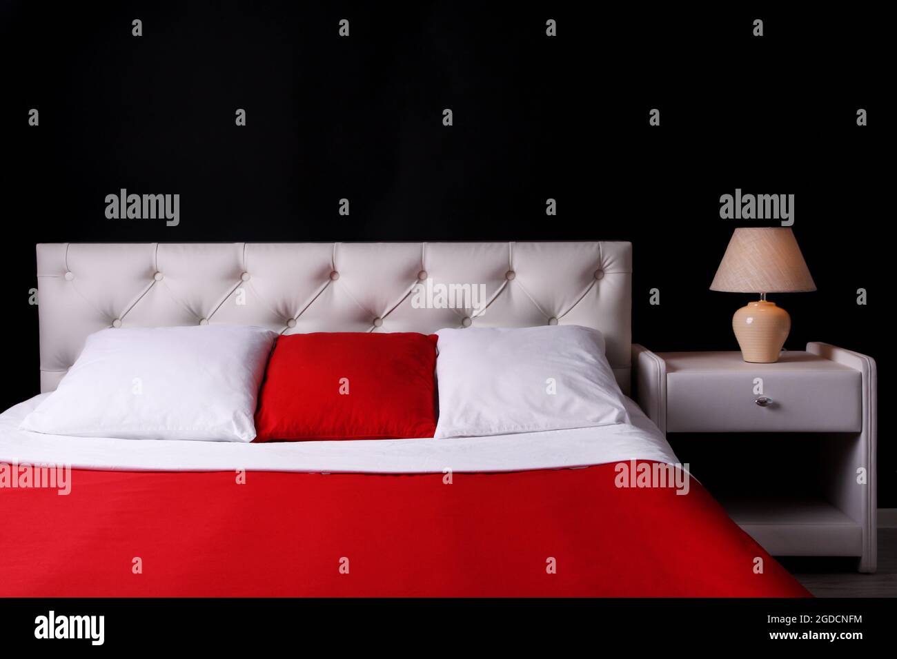 Comfortable soft bed in room Stock Photo Alamy