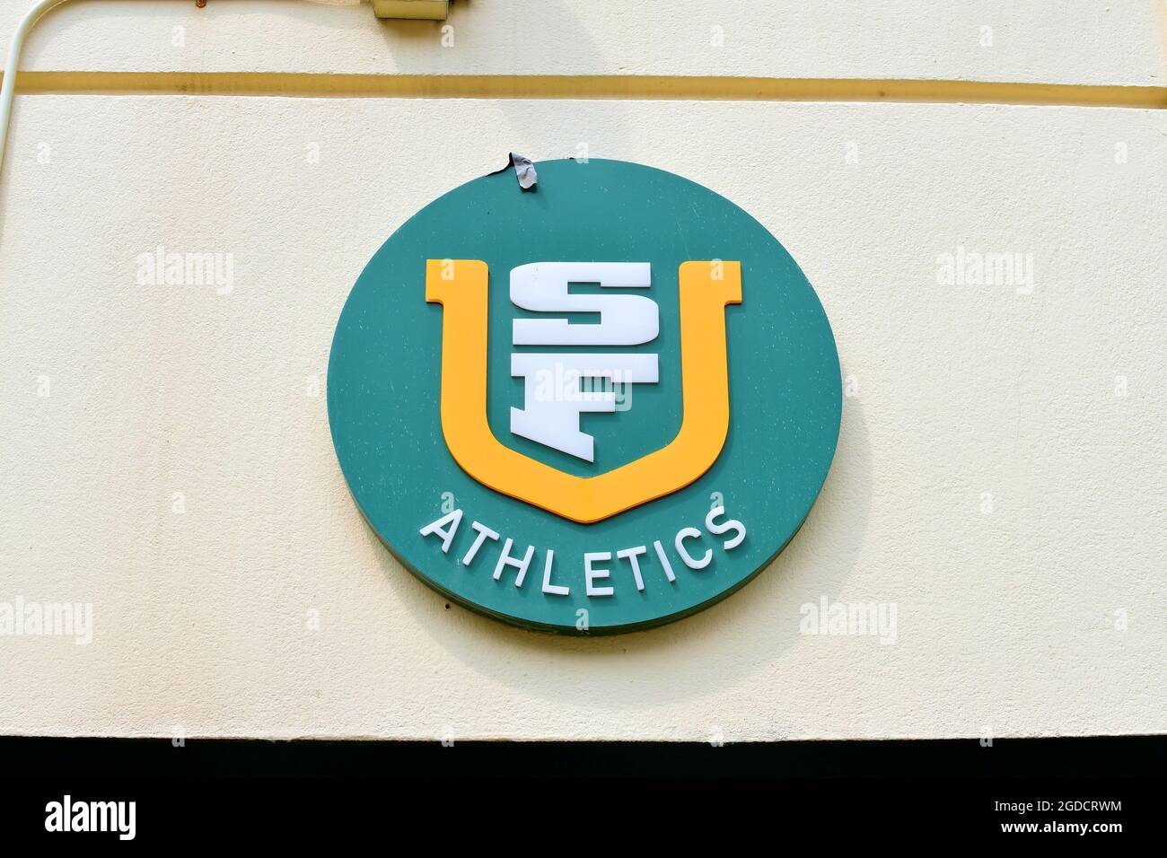 University of San Francisco sports teams logo on a campus building near