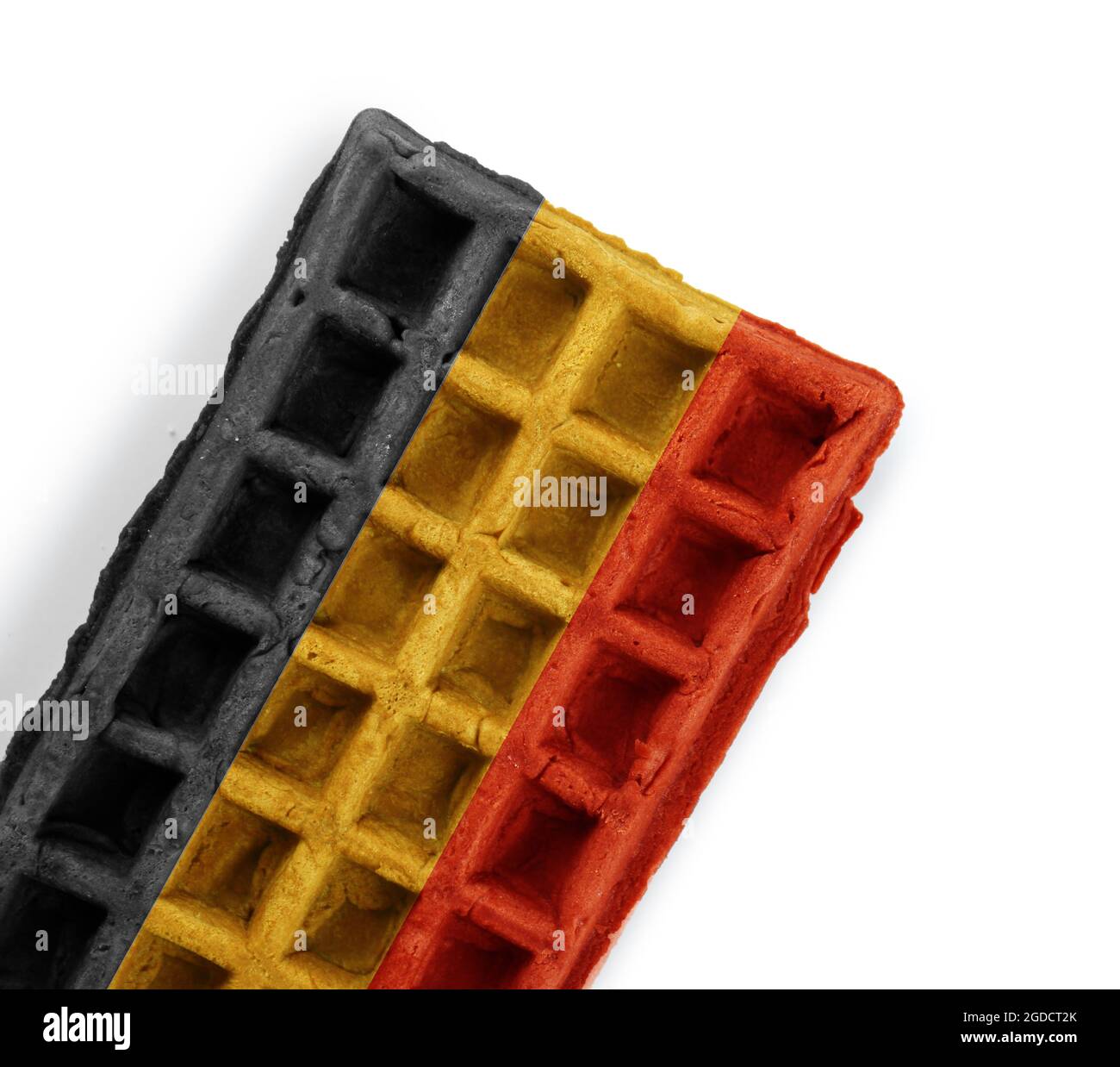 Delicious waffle in colors of Belgian flag on white background Stock