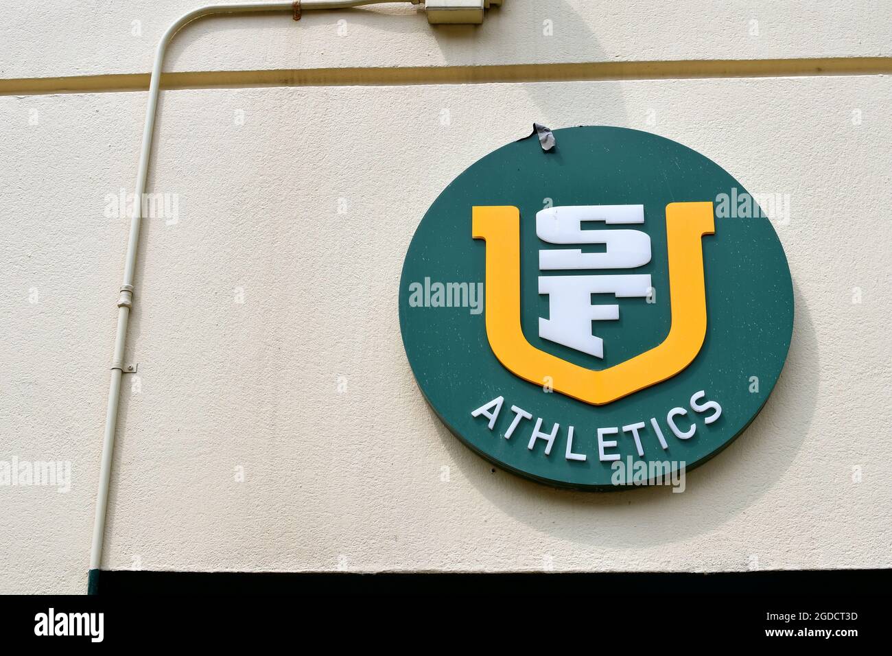 University of San Francisco sports teams logo on a campus building near