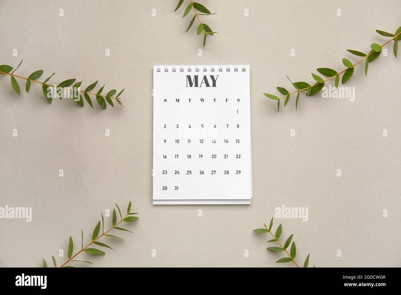 calendar-with-green-branches-on-light-background-stock-photo-alamy