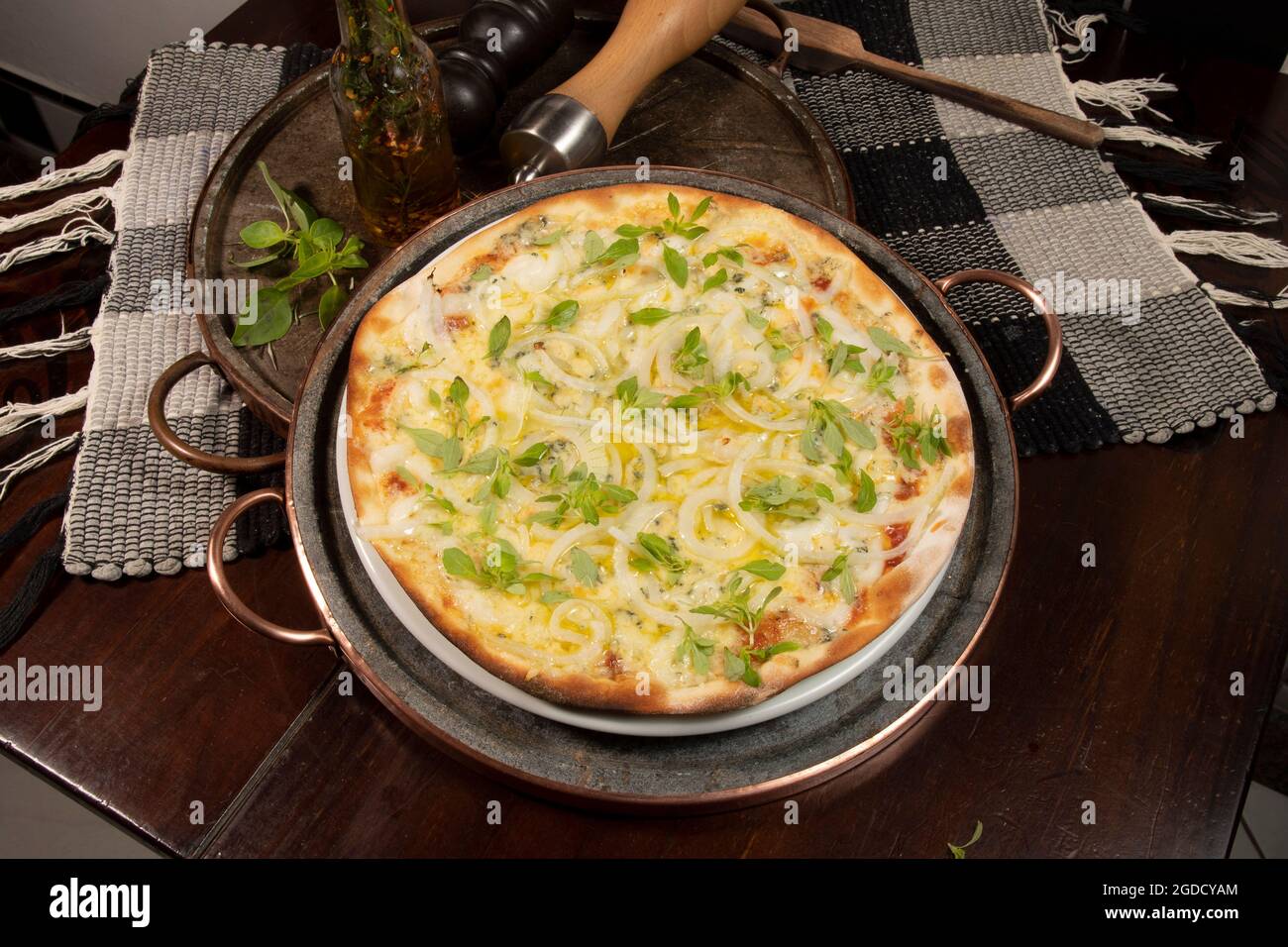 Brazilian style pizza with mozzarella, cheese, onion, top view Stock ...