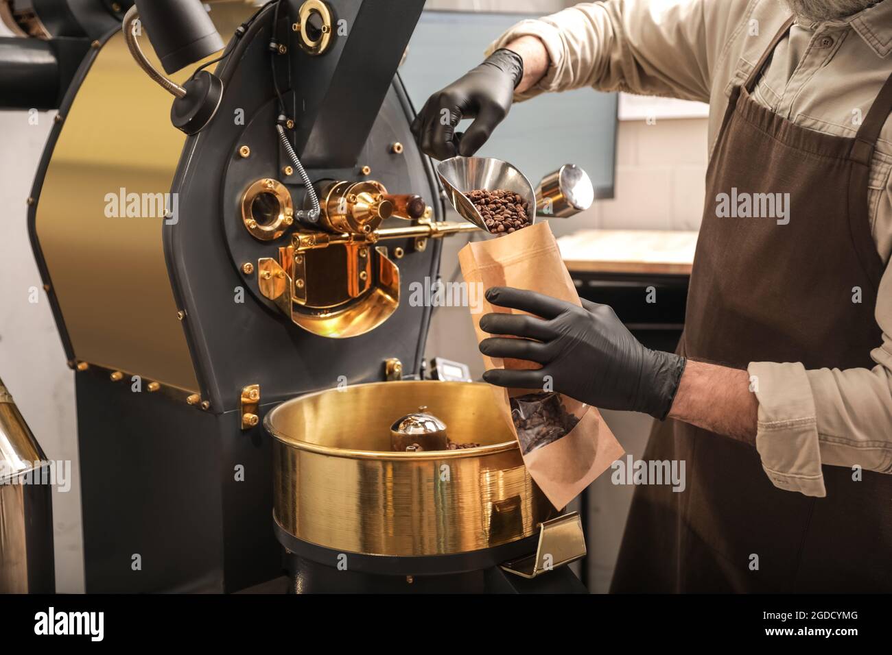 Coffee packaging production hi-res stock photography and images - Alamy