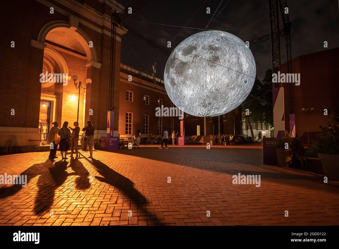 London, UK. 12th August, 2021. Museum of the Moon installation by Luke Jerram currently on display in Kensington Town Square. Credit: Guy Corbishley/Alamy Live News Stock Photo