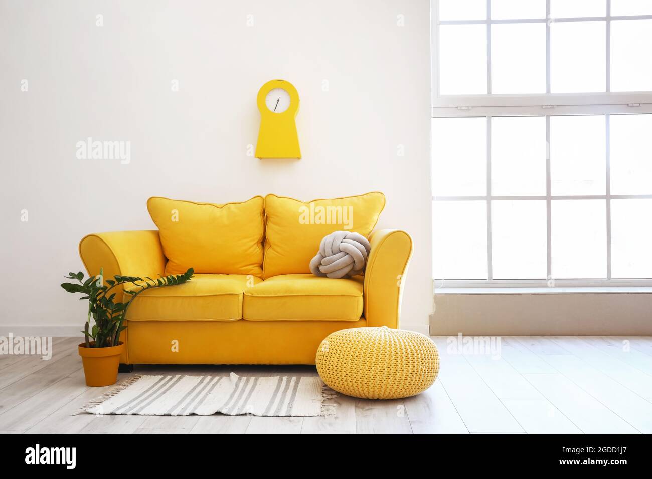 Interior of stylish living room with cozy sofa Stock Photo - Alamy