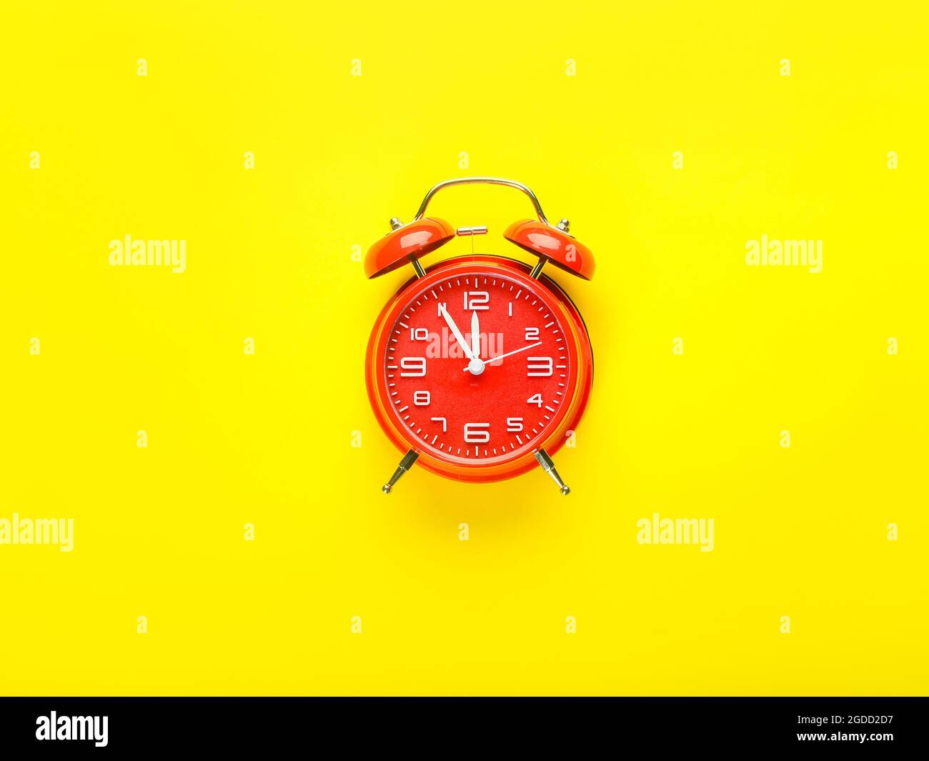 Stylish alarm clock on color background Stock Photo - Alamy