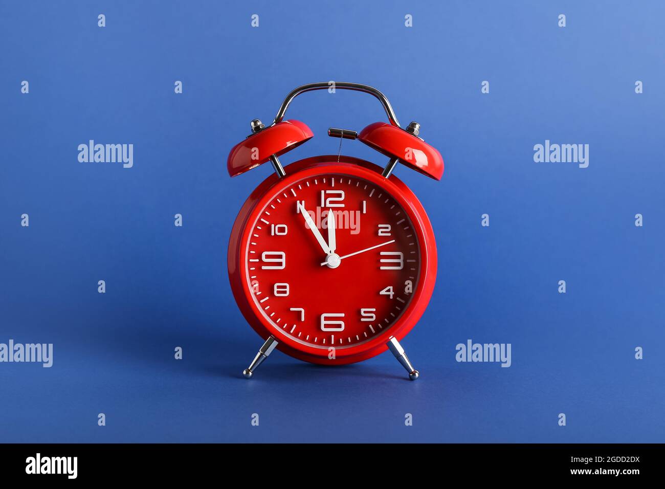 Stylish alarm clock on color background Stock Photo Alamy