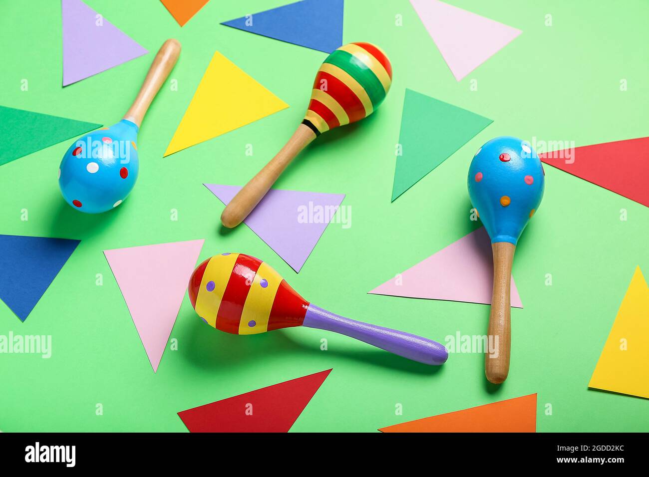 Mexican maracas and decor on color background Stock Photo - Alamy
