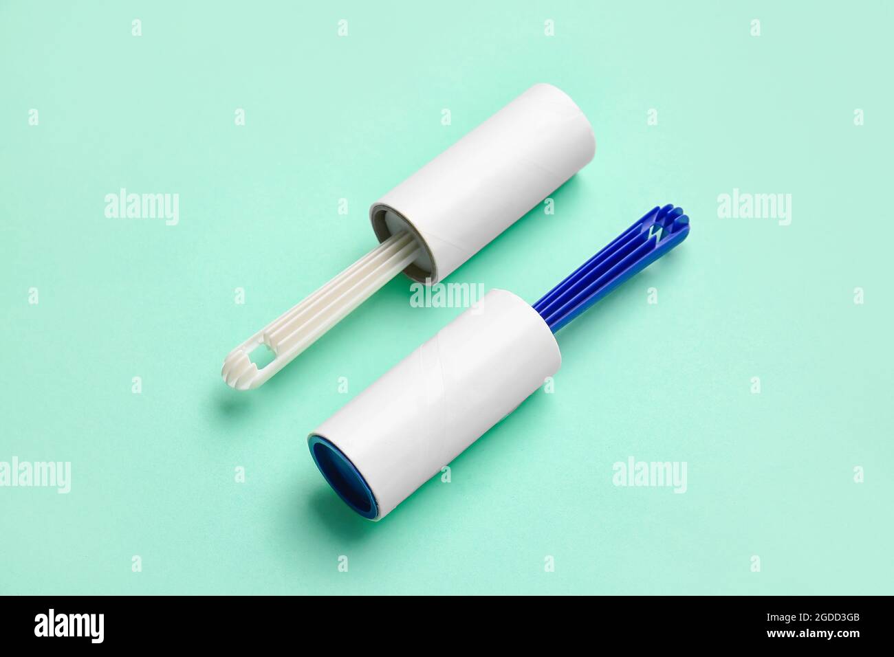 Lint rollers on color background Stock Photo
