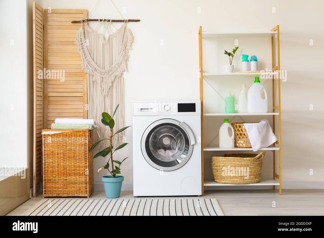 Interior of bathroom with modern washing machine Stock Photo Alamy