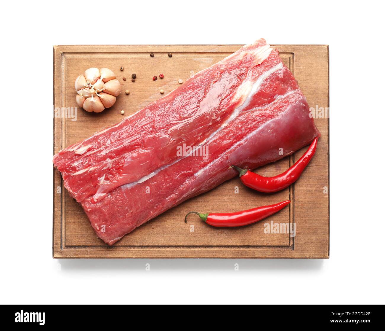 Wooden board with raw beef brisket on white background Stock Photo - Alamy