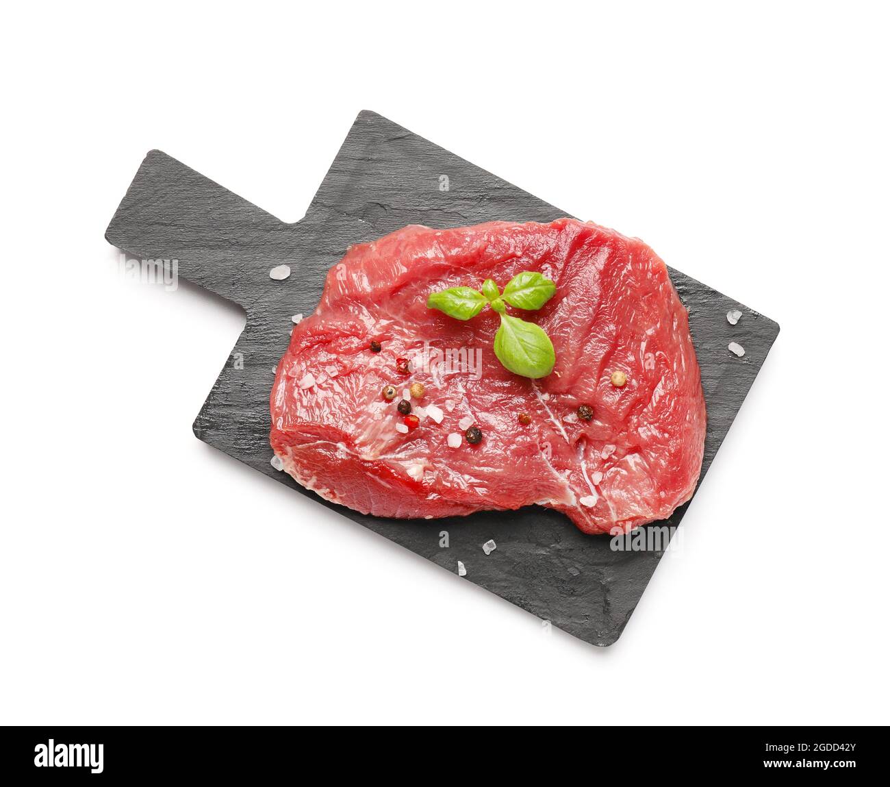Board with raw beef meat and spices on white background Stock Photo - Alamy