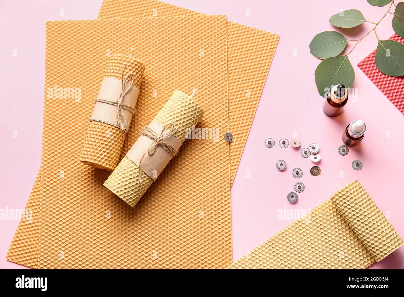 Composition with handmade wax candles on color background Stock Photo ...