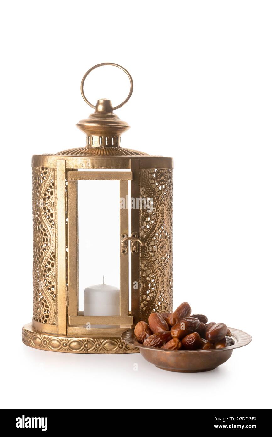 Muslim lantern with dates on white background Stock Photo