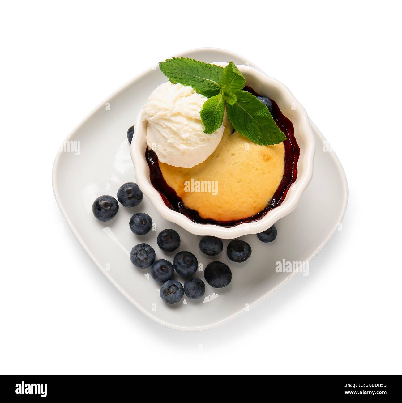 Ramekin with blueberry cobbler and ice cream on white background Stock ...