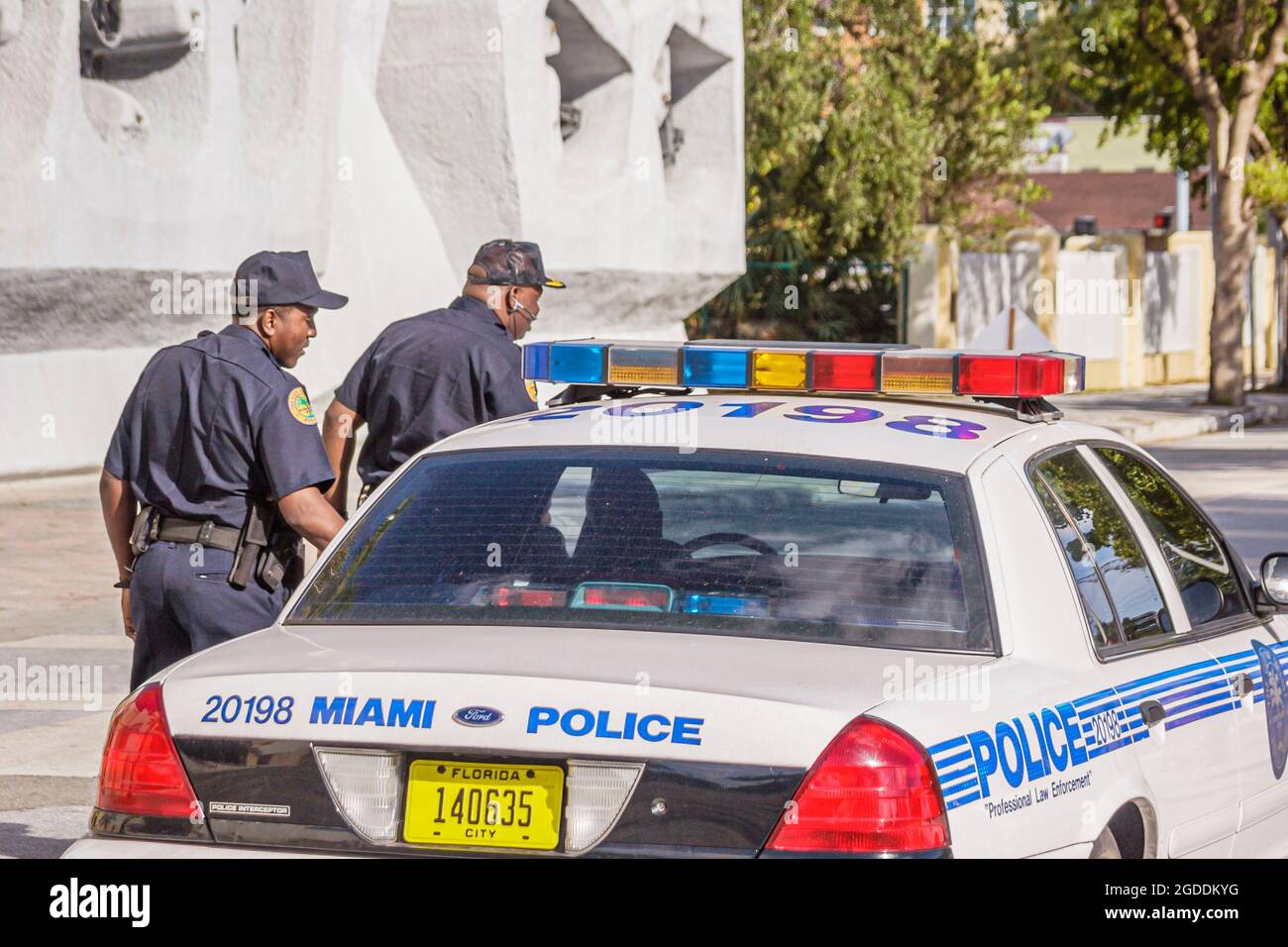 Miami Florida,Black policeman law officers police car vehicle, Stock Photo