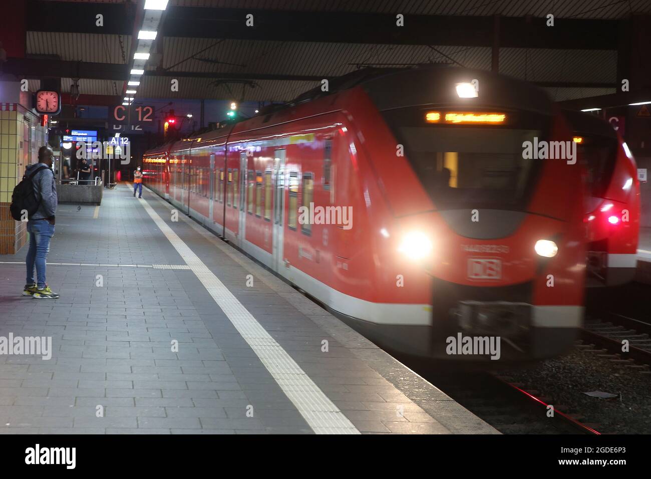 German text Streik (meaning strike) over rusty metal railway tracks and  brackets in a ballast bed, selected focus, narrow depth of field Stock  Photo - Alamy