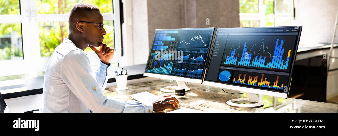 African Advisor Using KPI Dashboard With Financial Analytics Graphs Stock Photo