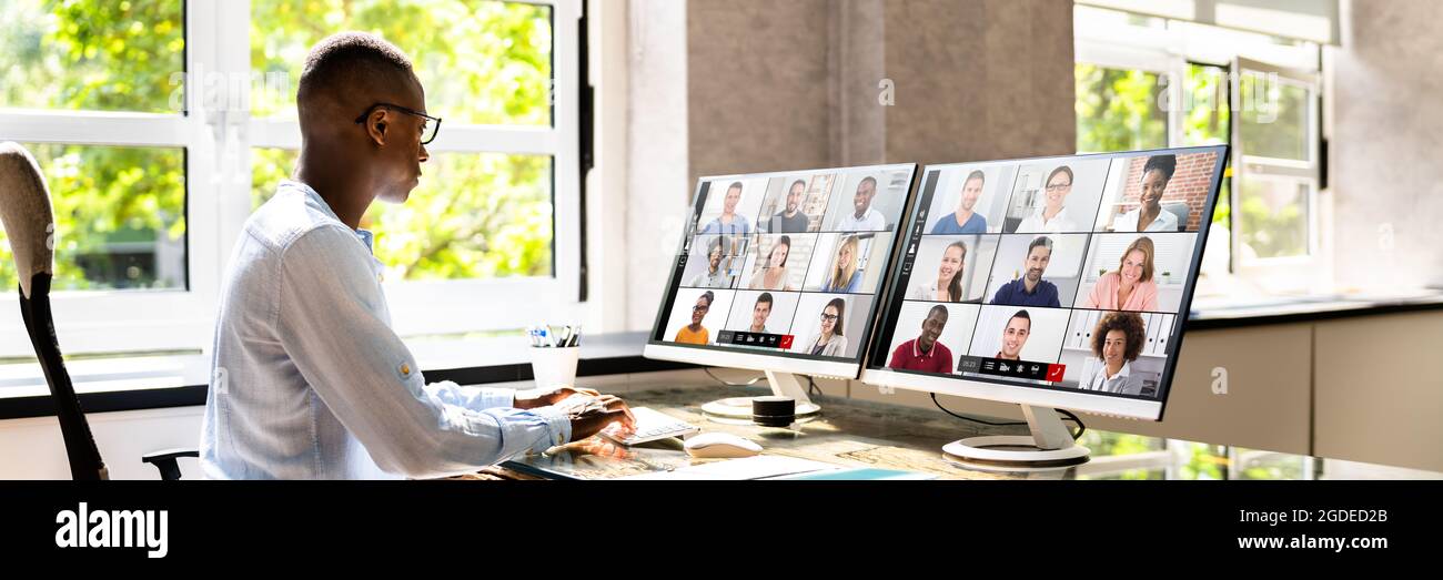 African American Watching Video Conference Business Webinar Stock Photo