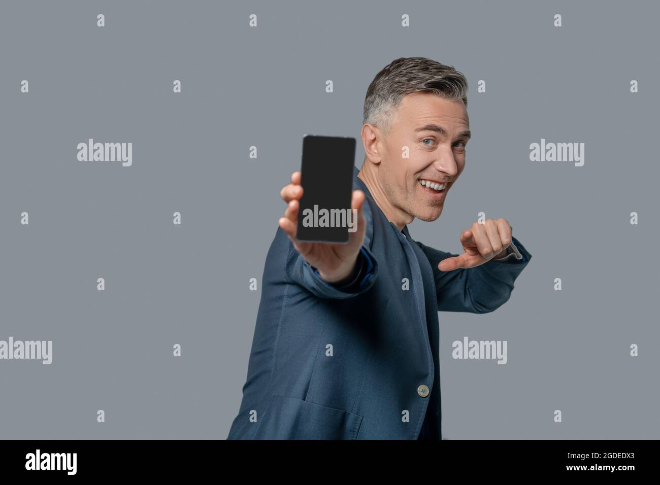 Happy enthusiastic man showing hi-res stock photography and images - Alamy