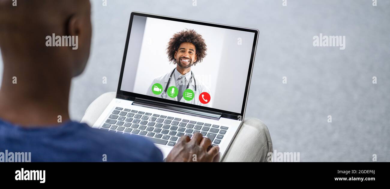 Online Video Conference With Medical Doctor On Laptop Stock Photo