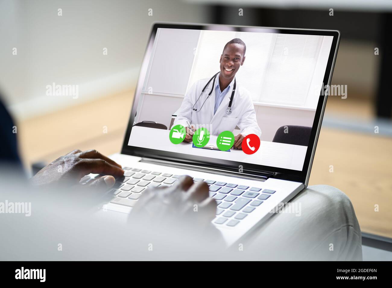 Online Video Conference With Medical Doctor On Laptop Stock Photo