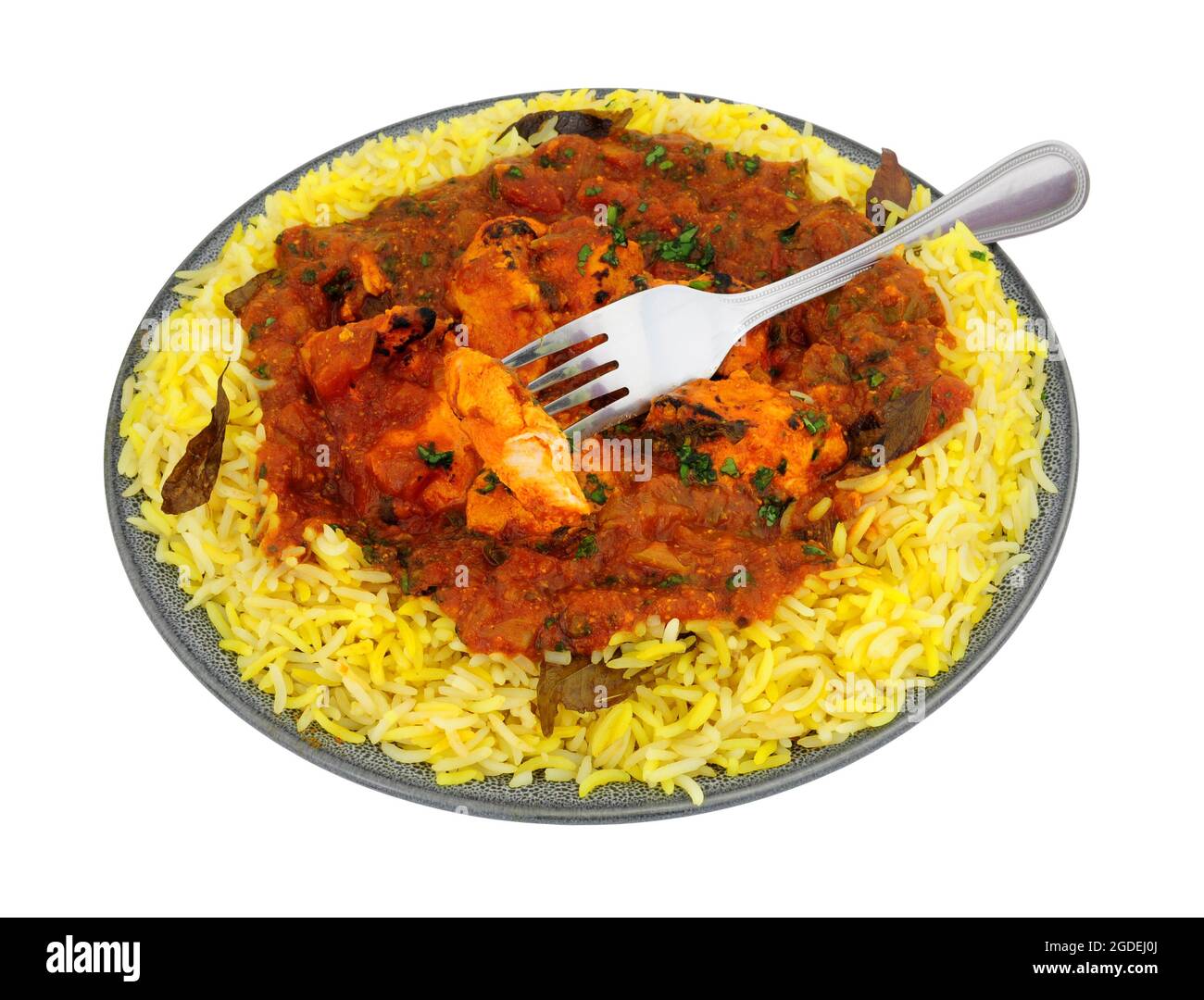 Indian chicken jalfrezi curry meal with fragrant pilau rice isolated on a white background Stock Photo