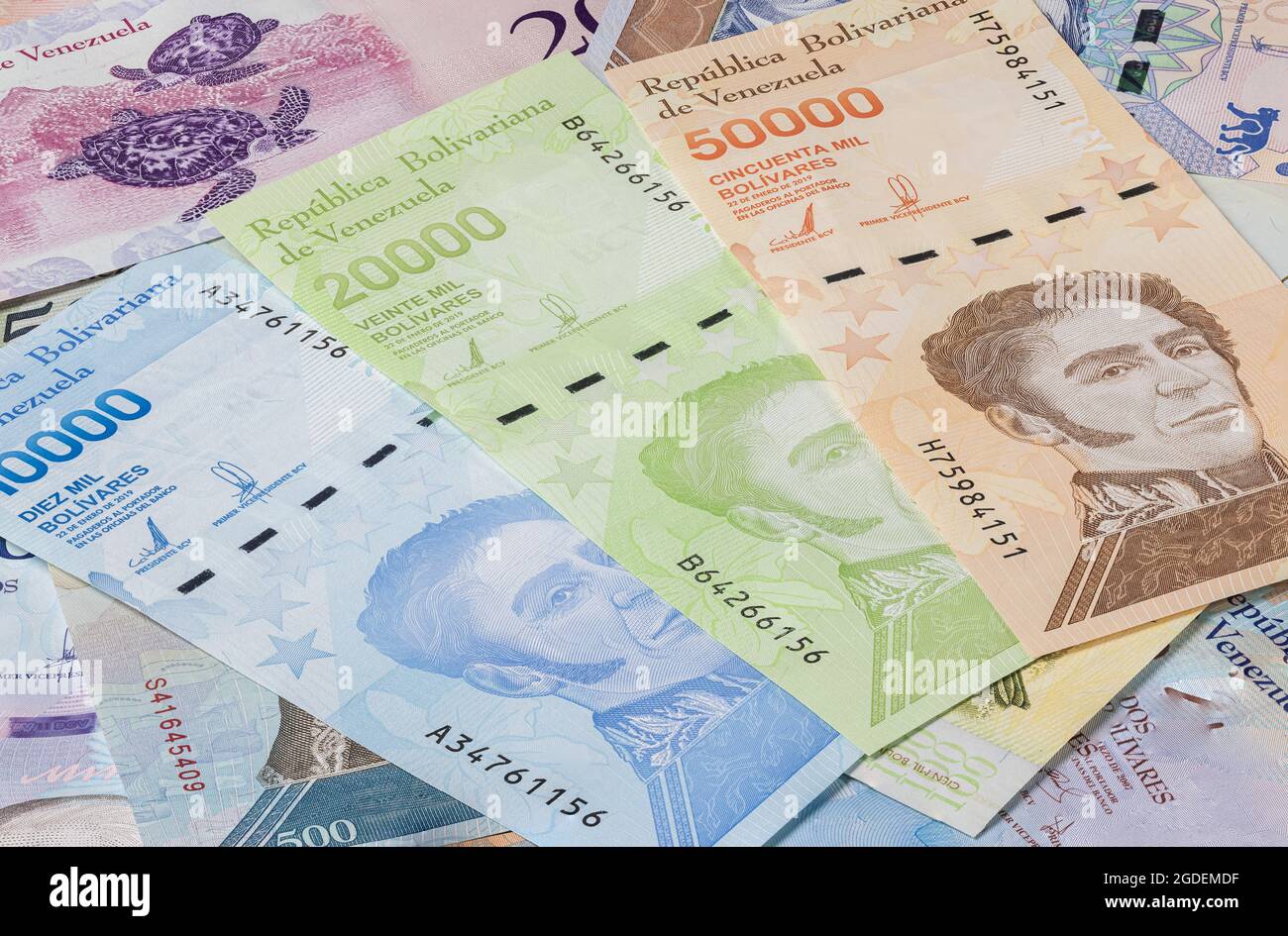 Close up to the currency of the south American country Venezuela. High inflation and weak economy increases the denomination of the banknotes. Bolivar Stock Photo