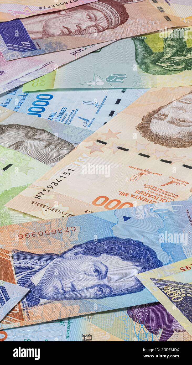 Close up to the currency of the south American country Venezuela. High inflation and weak economy increases the denomination of the banknotes. Bolivar Stock Photo