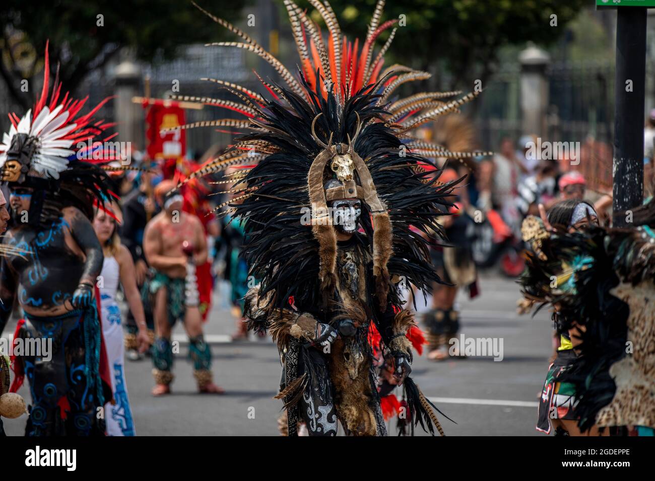Mexiko Stadt, Mexico. 12th Aug, 2021. A man takes part in a dance on the Zocalo in Mexico City as part of the commemoration of the fall of the Aztec capital Tenochtitlán. In 2021, Mexico will mark the 500th anniversary of the conquest of the Aztec land by the Spanish. (to dpa: Moctezuma's legacy: Mexico reworks conquest after 500 years) Credit: Jair Cabrera Torres/dpa/Alamy Live News Stock Photo