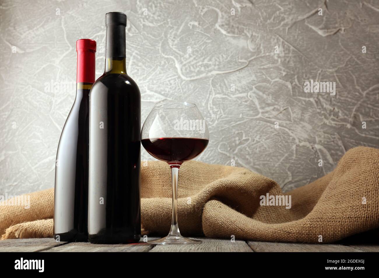 Bottles of wine with glass Stock Photo Alamy