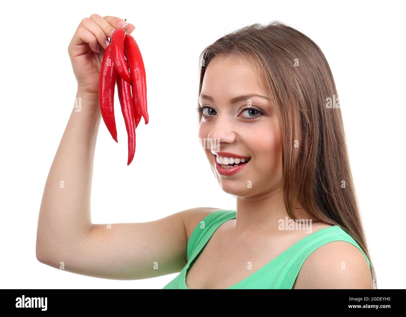 Beautiful girl with chili pepper, isolated on white Stock Photo Alamy