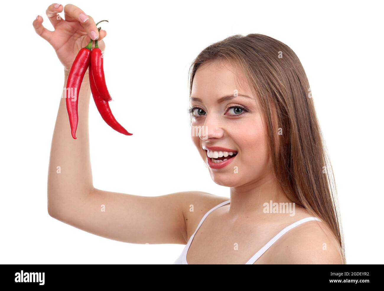 Beautiful girl with chili pepper, isolated on white Stock Photo Alamy