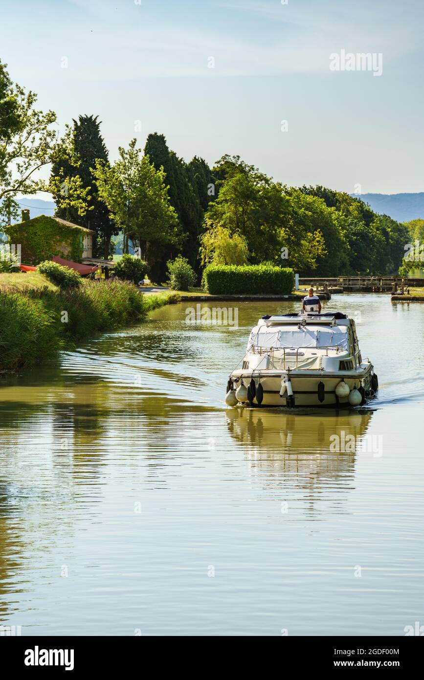 Carcassonne, France. August 3, 2021. Recreational boat cruises in Canal du Midi. Stock Photo
