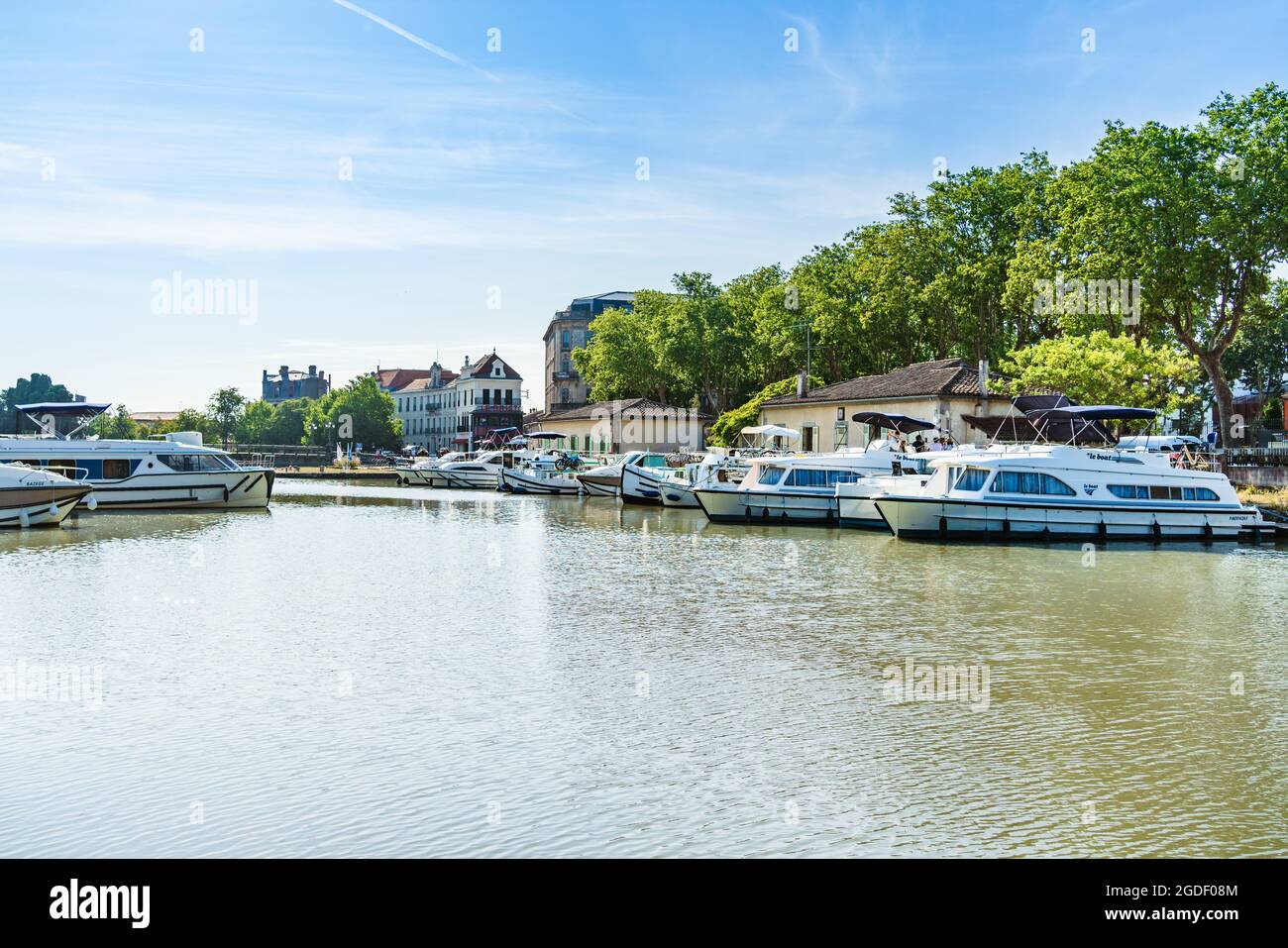 Carcassonne, France. August 3, 2021. Leisure boats moored in Carcassonne Port, Canal du Midi. Stock Photo
