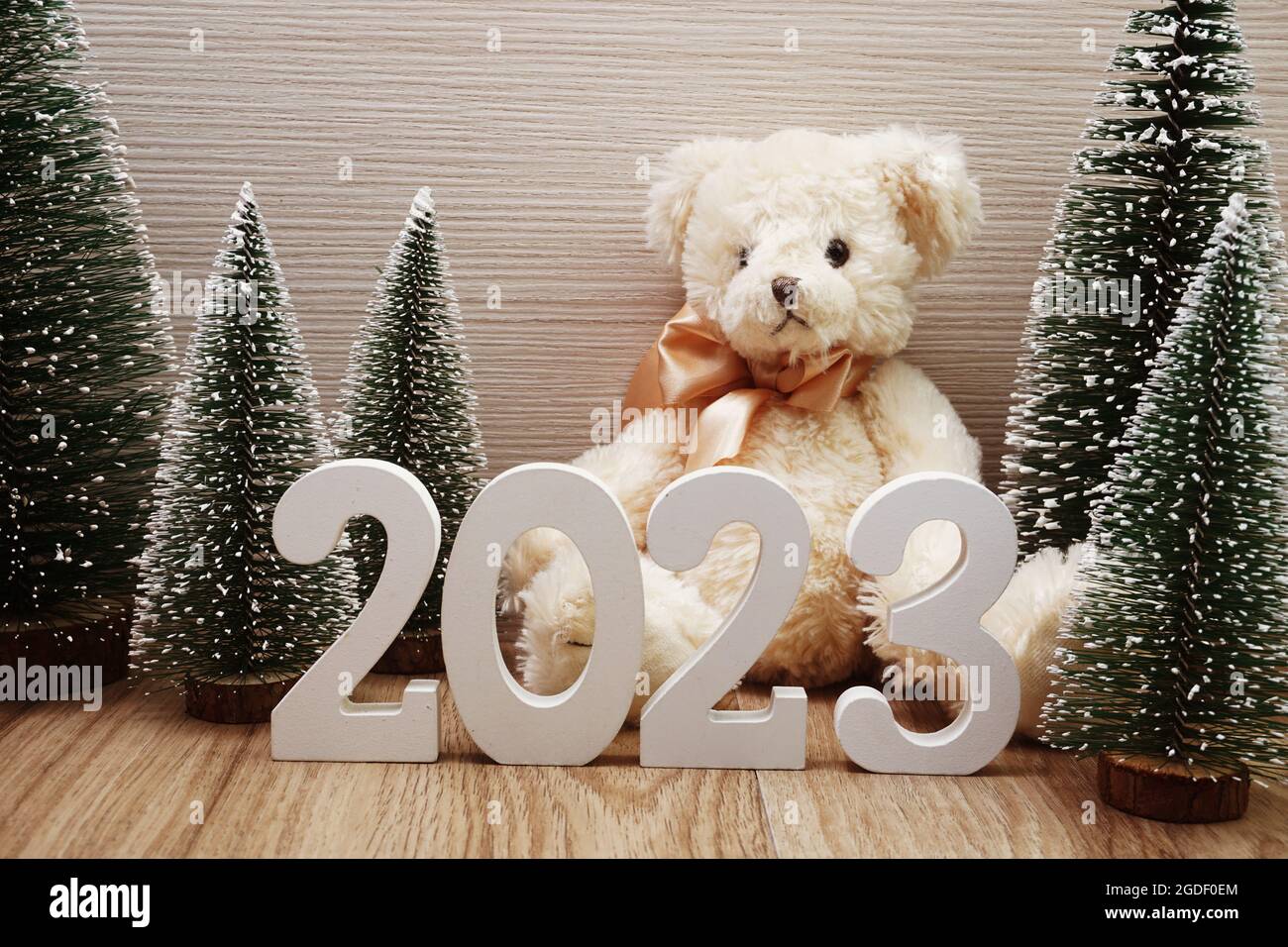 Happy New Year 2023 festive background with Christmas tree and