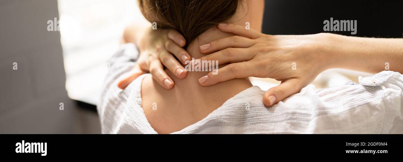 Office Ergonomics. Neck Pain And Bad Posture At Computer Stock Photo