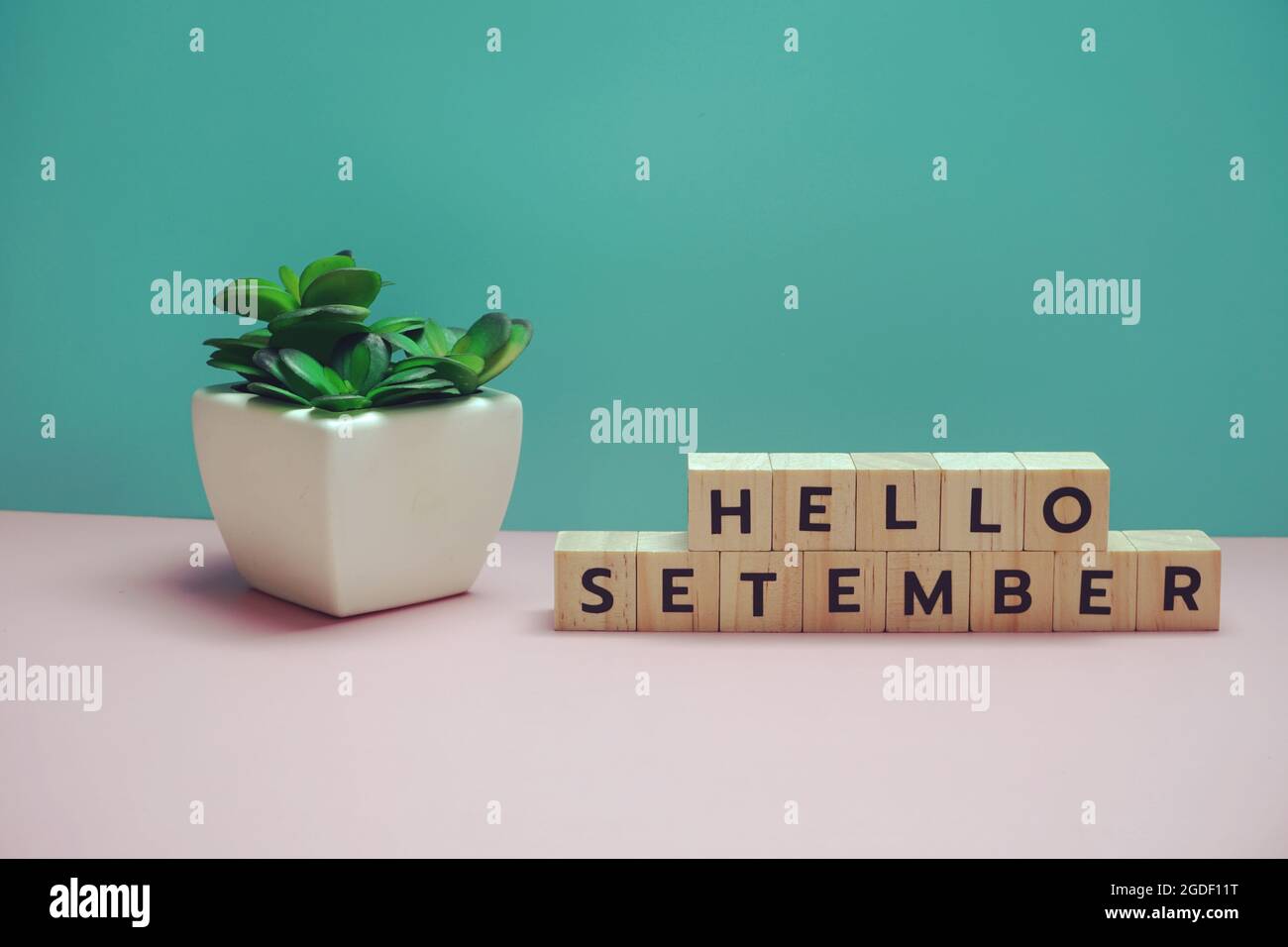 Hello September alphabet letter on blue and pink background Stock Photo ...