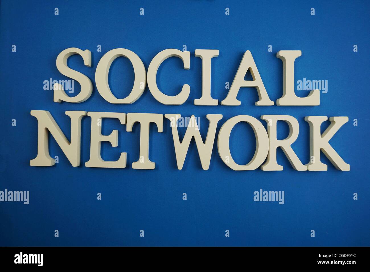 Social Network alphabet letters on blue background Stock Photo - Alamy