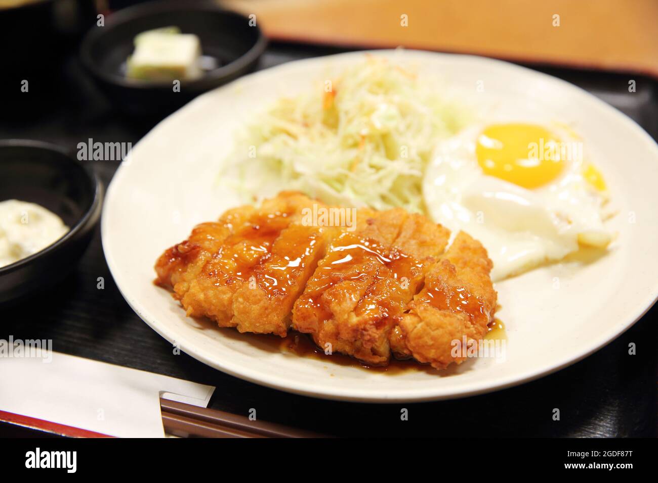 Japanese deep fried pork with egg and sauce Stock Photo Alamy