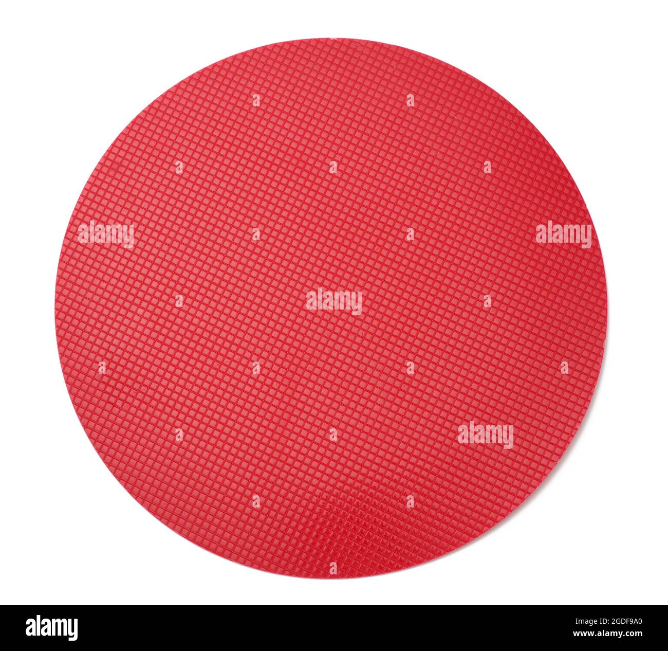 empty red plastic textured cake plate on white isolated background, top view Stock Photo