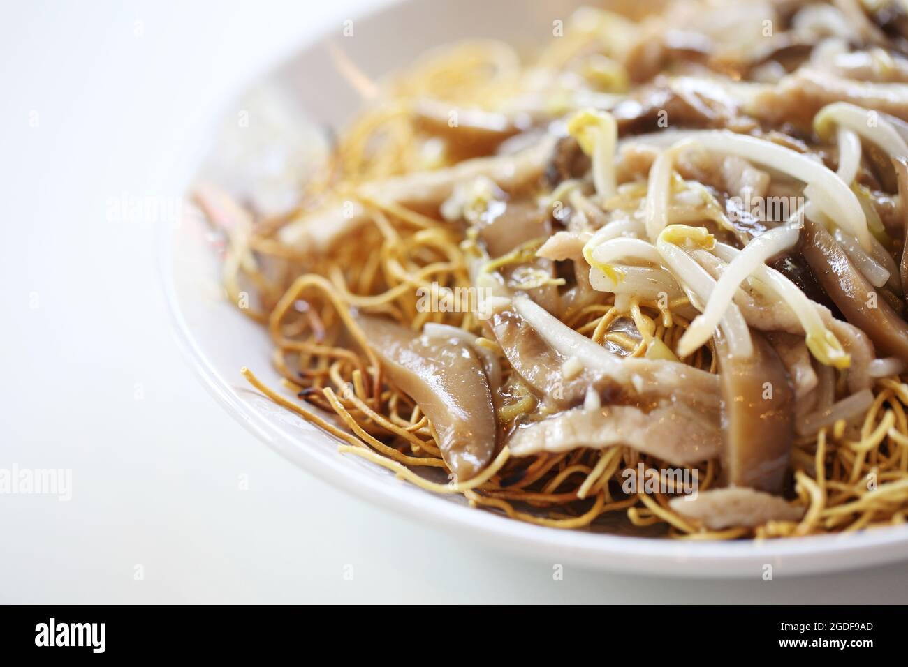 Crispy egg noodles with pork Stock Photo Alamy